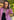 Woman wearing the Sedona in Black Luxury Apple Watch Band with stitching and a black dress and pink blazer- Chalonne