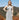 Model wearing the Sorrento in Bleu luxury Apple watch band by Chalonne and a gray dress in the Santa Monica Mountains