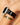 Woman wearing Orleans in Glossy Black Apple Watch band with jewelry