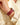 Sorrento in Rouge luxury apple watch band on model wearing beige perforated trench coat- Chalonne