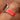 Chalonne Liquid in Coral, patent leather, Apple Watch band on model 