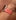 Chalonne Liquid in Coral, patent leather, Apple Watch band on model 