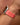 Chalonne Liquid in Coral, patent leather, Apple Watch band on model 