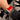 Liquid in Red Apple Watch band on model with black and gray top