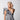 Model wearing the Orleans in gray luxury alligator Apple Watch band with a gray ruffled top