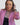 Woman wearing the Sedona in Black Luxury Apple Watch Band with stitching and a black dress and pink blazer- Chalonne