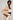 A model wearing the Waiheke in cream shearling Apple Watch band and a beige trench coat over a cream crop top and white pants